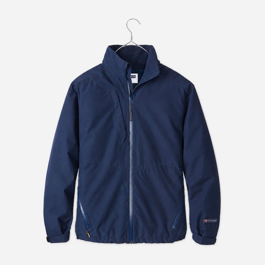 Boathouse Men's Waterproof Barrier Jacket in Navy, front view on a chrome hanger