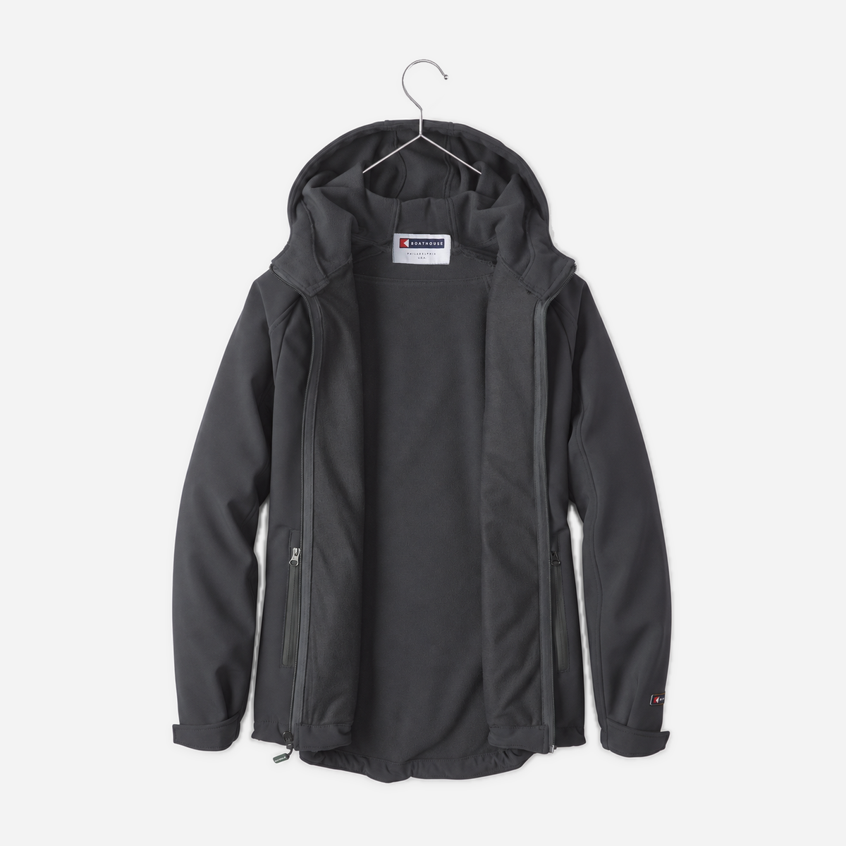 Boathouse Women's Elevate Soft Shell Jacket in Graphite, front view on a chrome hanger