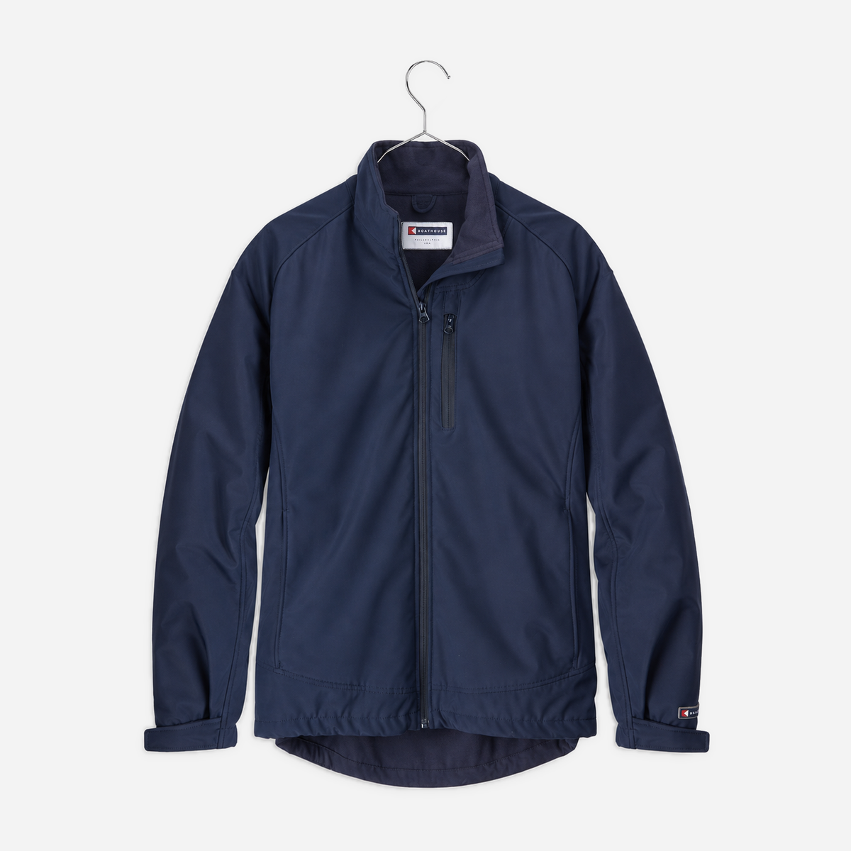 Boathouse Men's Equinox Soft Shell Jacket in Navy, front view on a chrome hanger