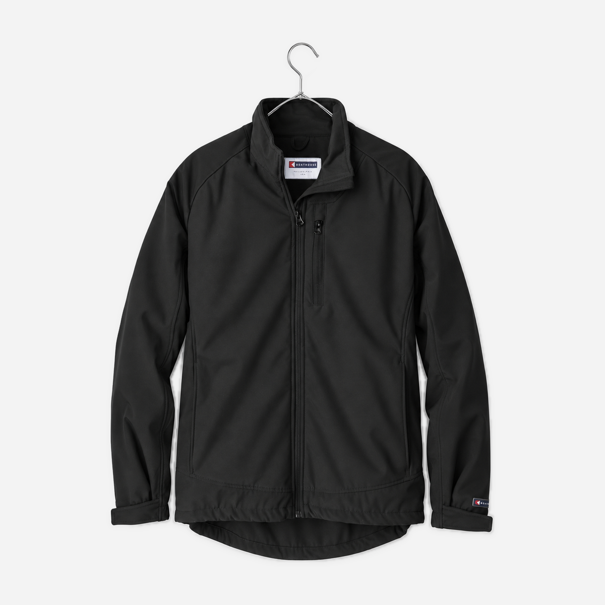 Boathouse Men's Equinox Soft Shell Jacket in Black, front view on a chrome hanger
