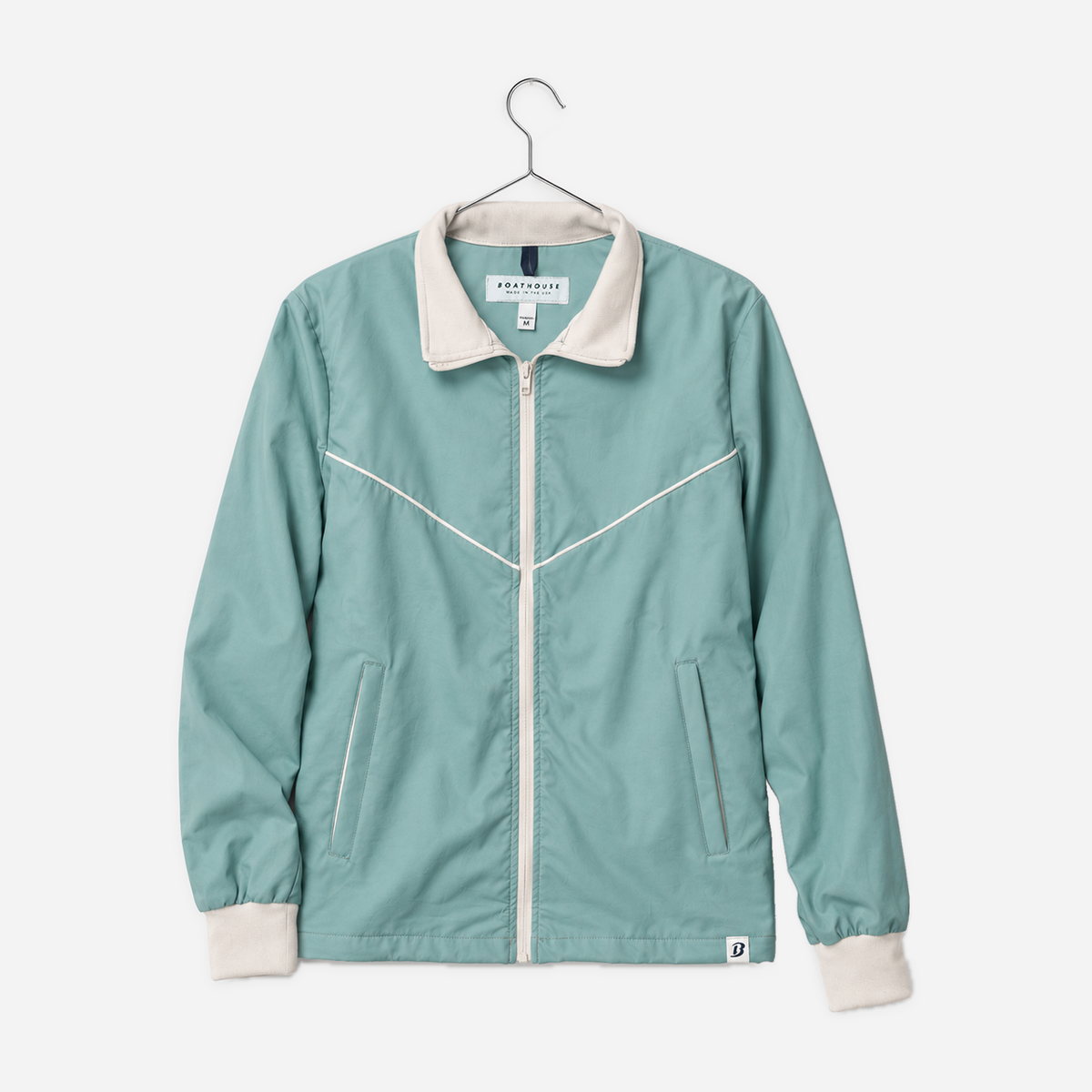 Boathouse Women's Classic Jacket in Sage, front view on a chrome hanger