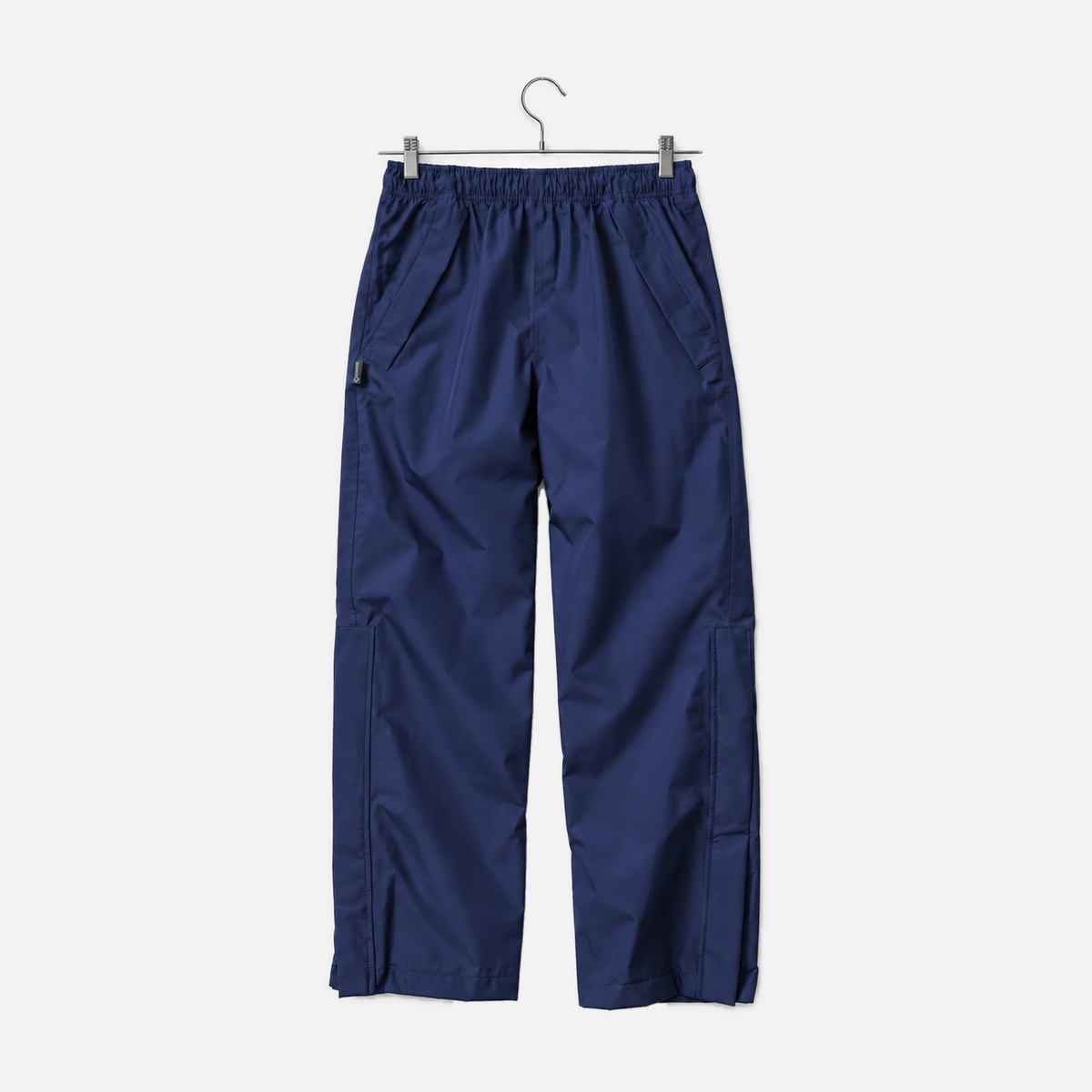Boathouse Women's Waterproof Pants in Navy, front view on a chrome hanger