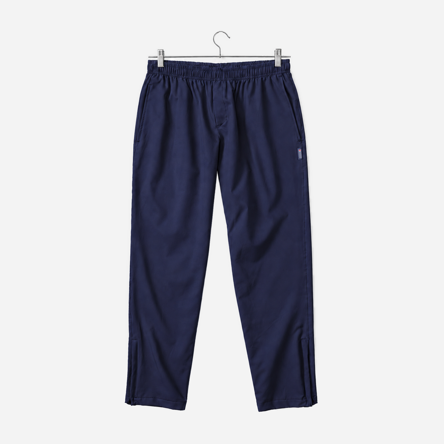 Boathouse Men's Journey Pants in Navy, front view on a chrome hanger