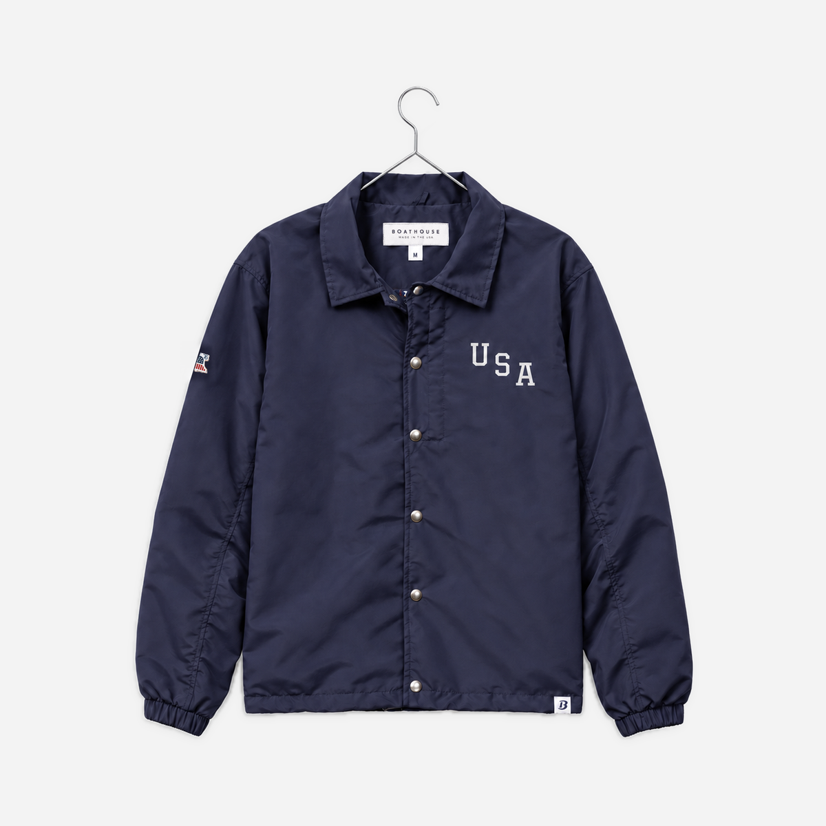 Boathouse USA Coaches Jacket in Navy, front view on a chrome hanger