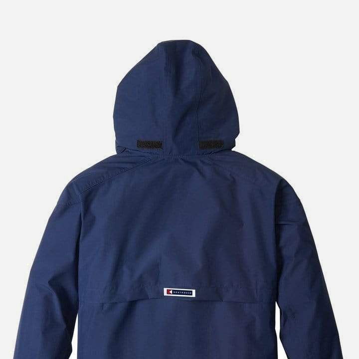 Boathouse Men's Waterproof Barrier Jacket in Navy, rear hood, closure tabs and back yoke
