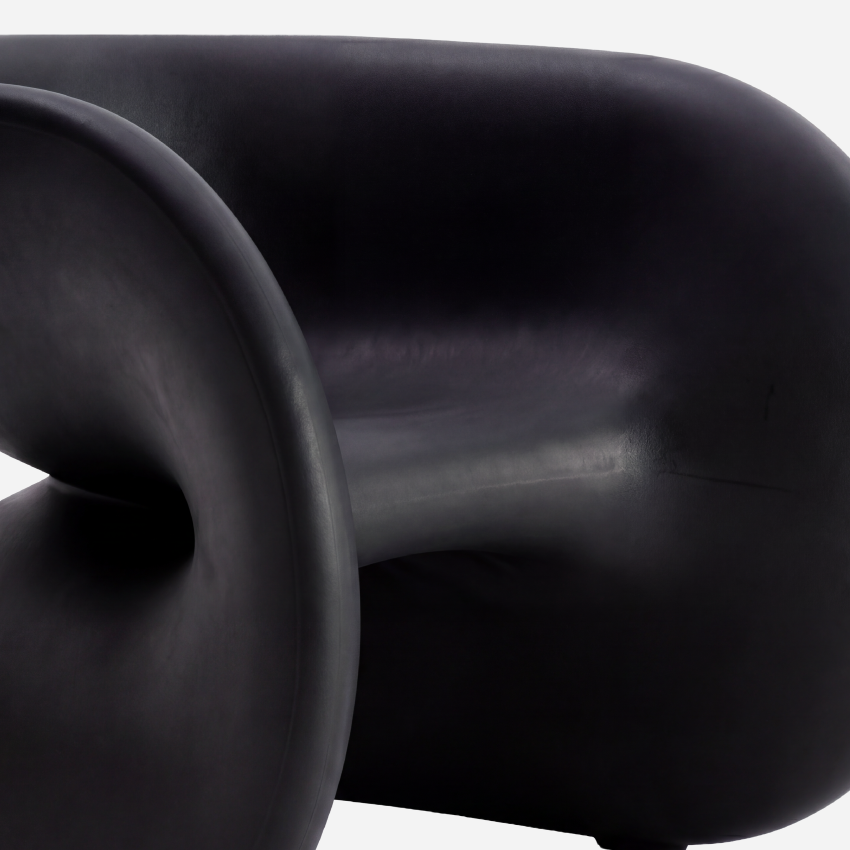 The Fortune Chair, Licorice, curved seat and molded surface detail