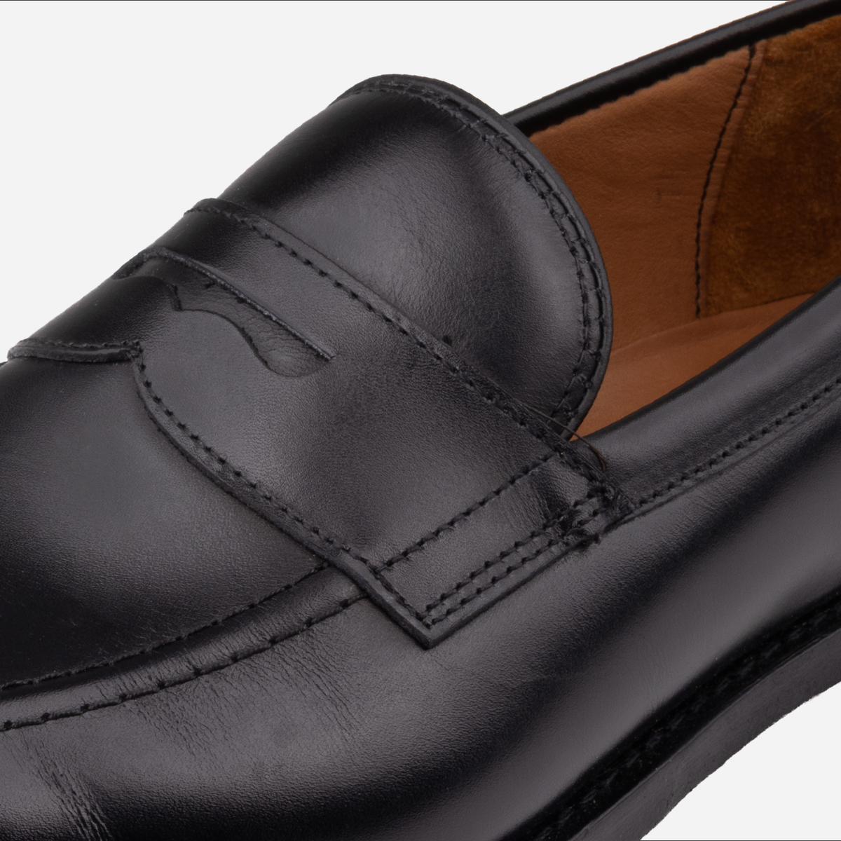 Allen Edmonds Randolph 2.0 Penny Loafer, Black Leather, penny strap and stitching detail
