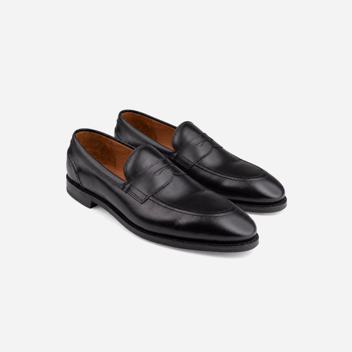 Pair of Allen Edmonds Randolph 2.0 penny loafers in Black Leather, three-quarter view